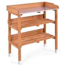 a wooden shelf with two shelves and one shelf on the bottom is holding an empty tray