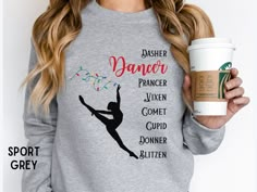 It's time we all recognize and celebrate the best reindeer of them all - DANCER! Great gift for the dancers, dance teachers, and lovers of holiday puns in your life!  Looking for other styles or a matching accessory? Look no further! 🛍️ Canvas Bag: https://sarahsapparelstudio.etsy.com/listing/1577095029 👚 T-Shirt: https://sarahsapparelstudio.etsy.com/listing/1576882043 🎽 Tank Top: https://sarahsapparelstudio.etsy.com/listing/1577070595 👧 Youth Tee: https://sarahsapparelstudio.etsy.com/listin Circut Joy, Dancer Things, Reindeer Cute, Holiday Puns, Teacher Gift Christmas, Santa's Reindeer, Christmas Dance, Dance Teachers, Cute Reindeer