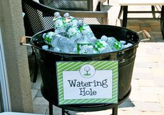 a bucket filled with water sitting on top of a patio