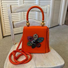 Brilliant, Orange Patent Leather Crossbody Evening Bag, By Iris Lane. Beautifully Preserved Crystal Ornaments On The Front. Worn One Or Two Times. Excellent Condition True Conversation Piece. Orange Evening Shoulder Bag With Detachable Strap, Evening Orange Shoulder Bag With Detachable Strap, Orange Shoulder Bag With Detachable Strap For Evening, Elegant Orange Shoulder Bag For Evening, Orange Evening Bag With Detachable Handle, Orange Evening Bag With Detachable Strap, Luxury Orange Evening Bag, Luxury Orange Evening Bags, Crystal Ornament