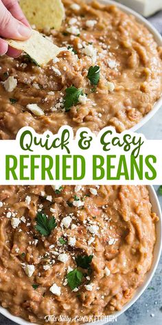 a hand dipping a tortilla chip into a bowl of refried beans