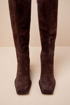 The Matisse Highness Chocolate Suede Leather Distressed Knee-High Boots are what cold weather dreams are made of! Soft genuine suede leather, with subtle distressing, shapes these perfect fall boots with a squared-toe upper that rises to a 13.5"" knee-high shaft with a 15"" circumference. A 14.5"" zipper and an elastic gusset at the instep make for easy on-and-off, all atop a contrasting, distressed block heel. Stitching details throughout. 3" distressed block heel. Cushioned insole. Rubber sole has nonskid markings. Genuine suede leather upper. Balance man made materials. Imported. Lulus | Highness Chocolate Genuine Suede Leather Distressed Knee-High High Heel Boots | Size 10. Perfect Fall Boots, Young Money, Fall Boots, High Leather Boots, Suede Boots Knee High, Stitching Details, Knee High Leather Boots, Heel Boots, High Heel Boots