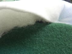 the wool is white and green in color