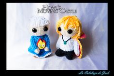 two small crocheted dolls sitting next to each other on a white background with the caption how's moving castle