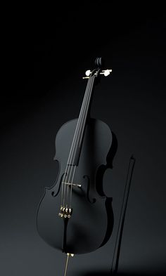 a black violin sitting on top of a table