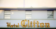 a hotel sign is shown in front of a building