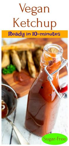 a jar filled with ketchup sitting on top of a wooden table next to other foods