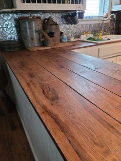 a wooden counter top in a kitchen