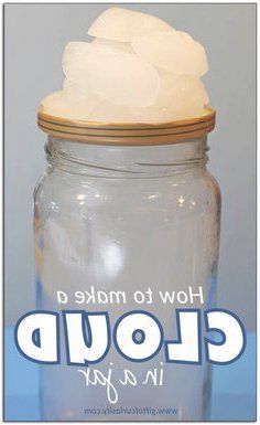 a glass jar filled with ice cream sitting on top of a table