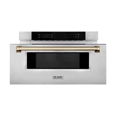 a stainless steel oven with gold trimmings on the top and bottom, against a white background