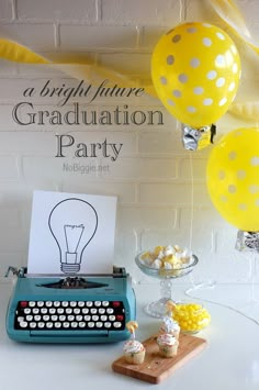 an old fashioned typewriter and balloons are on display at a graduation party with yellow streamers