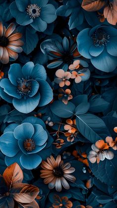 blue and orange flowers with leaves on them