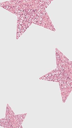 pink glitter stars on a white background