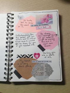 an open notebook with writing and pictures on it