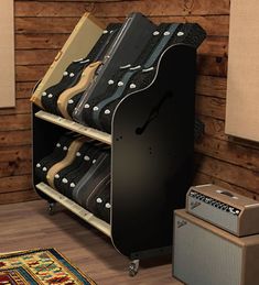 the guitar case is next to two amps and a rug in front of it