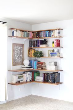 an empty room with bookshelves full of books