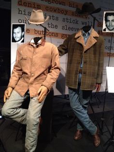 two mannequins dressed in cowboy hats and jackets