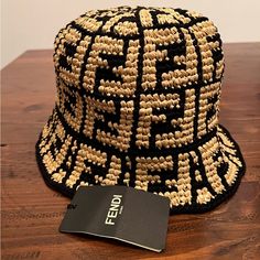 Brand New With Tags Narrow-Brimmed Bucket Hat Made Of All-Over Hand-Woven Beige Raffia With Black Ff Motif Composition 80% Viscose, 20% Cotton Raffia Bucket Hat, Fendi Bucket, Fendi Hat, Bucket Hat Outfit, Designer Bucket Hats, Fendi Accessories, Crochet Bucket, Fendi Logo, Crochet Bucket Hat