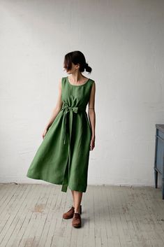 Sleeveless dress is made from 100% soft and washed linen.  Details: - Colour: Apple Green - Composition: 100% Oeko-Tex certified linen - A line style - Pockets - Linen belt included - Medium weight linen - Linen care: machine wash gentle; tumble dry low, ironing optional - The price is for one dress, other pictured items are not included Green Linen Sundress, Chic A-line Sleeveless Linen Dress, A-line Sleeveless Linen Dress For Daywear, Summer Linen A-line Sleeveless Dress, Green Linen A-line Midi Dress, Green Linen V-neck Dress, Linen Belt, Green Sleeveless Dress, Green Linen Dress