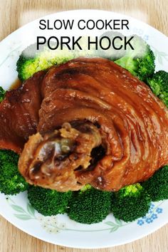 slow cooker pork hock on a plate with broccoli