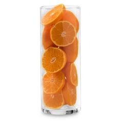 orange slices in a glass container on a white background