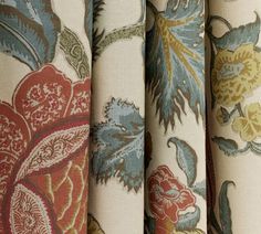 closeup of curtains with floral designs on them