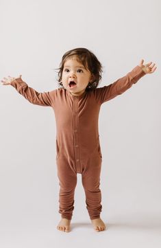 Supersoft organic cotton keeps your little one comfy in a long-sleeve romper. Front snap closure Front scoop pockets 100% organic cotton Machine wash, tumble dry Imported Unisex Long Sleeve Onesie For Loungewear, Long Sleeve Jumpsuits And Rompers For Fall Playtime, Solid Long Sleeve Onesie For Bedtime, Fall Long Sleeve Bubble Romper For Playtime, Solid Long Sleeve Bedtime Onesie, Solid Onesie For Playtime In Fall, Solid Long Sleeve Onesie For Playwear, Cotton Long Sleeve Onesie For Loungewear, Solid Color Long Sleeve Onesie For Playwear