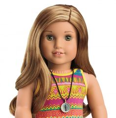 a close up of a doll wearing a dress with a necklace on it's neck