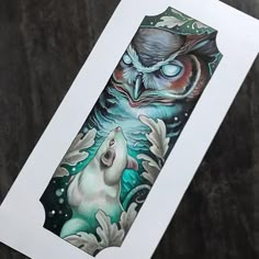 an owl and wolf tattoo design on a card