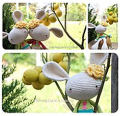 crocheted stuffed animals hanging from a tree