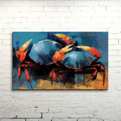 a painting on the wall of a white brick building with blue and orange crabs in it