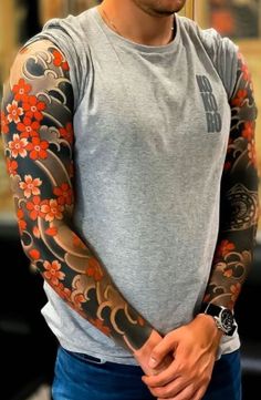 a man with a tattoo on his arm