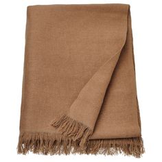 a brown blanket with fringes on it