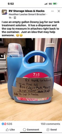 a blue plastic jug sitting on top of a counter