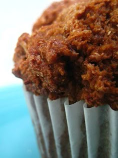 a muffin sitting on top of a blue plate