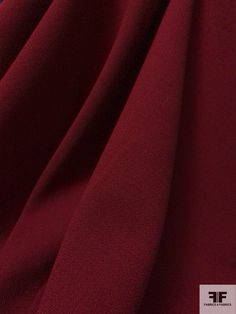 the fabric is very dark red and it looks like something from outer space