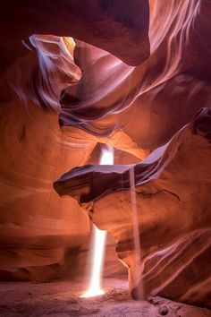 the light shines brightly through the canyon's walls