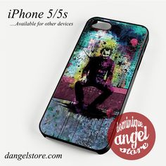 an iphone case with the image of a person sitting on a bench in front of it