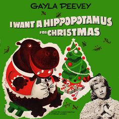 an advertisement for christmas with a hippopotamus