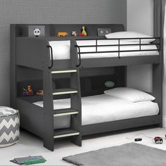 there is a bunk bed with a ladder on the bottom and two beds below it