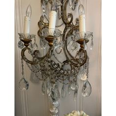 Italian Venetian three tier wall sconce. 6 lights. Wooden bobesches.  Beaded scrolling gilt metal frame.  Bagues style.  Crystal pendants with macaroni crystal swags.  A chain for electrical cord has been added with a switch.  A special piece that I’ve had for years, but I am downsizing. Electrical Cord, Crystal Pendants, Three Tier, Crystal Pendant, Macaroni, Chandeliers, Wall Lamp, Wall Sconces, Metal Frame