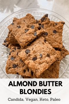 almond butter blondies on a glass plate with text overlay that reads, almond butter blondies