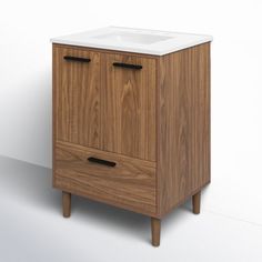 a wooden cabinet with a white sink on it's top and legs in front of a wall