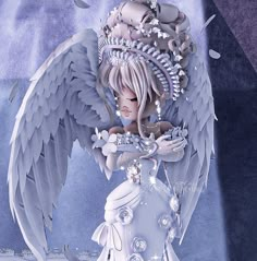 an angel is standing in the snow with her hands on her chest and wings outstretched