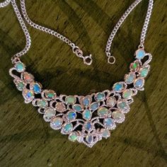 Amazing Ethiopian Opal Sterling Silver Bib Necklace. Bib Is 3 Inches Across And 1.5 Inches Down. Necklace Is 20 Inches Long. Bib Necklace, Ethiopian Opal, Womens Jewelry Necklace, Opal, Jewelry Necklaces, Necklaces, Women Jewelry, Sterling Silver, Silver