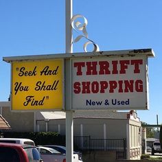 a sign that says thrift you shall't find new and used in front of a store