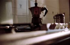 a coffee maker sitting on top of a counter