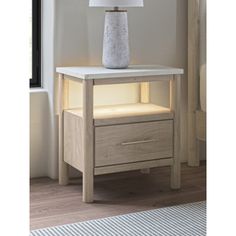 This nightstand reflects your sophisticated approach to boho style. Crafted with both form and function in mind, its replicated marble top beautifully contrasts a matte black finish. The chic and convenient bedside companion offers ambient lighting, along with USB and wireless charging options. And the versatile design suits all-neutral spaces or blends with your favorite pops of color. It’s inviting, yet posh. Luxe, yet laid-back. With this nightstand, your free-spirited vibe meets modern desi… Nightstand White, White Nightstand, Free Spirited, Boy's Room, Marble Top, Boys Room, Ambient Lighting, Form And Function, Ebern Designs