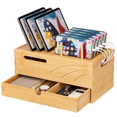 an iphone charging station with six cell phones in it