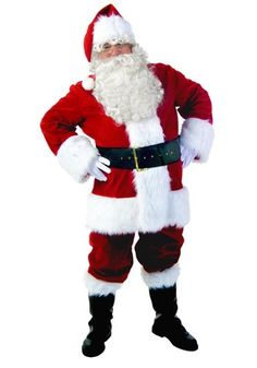 a man dressed as santa claus standing with his hands on his hips